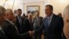 Russia's Foreign Minister Sergei Lavrov (R) meets with Syrian opposition leaders in Moscow July 11, 2012. 