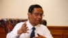 Menteri Koordinator Politk, Hukum, dan Keamanan Mohammad Mahfud MD dalam sebuah wawancara di Jakarta, 26 Desember 2019. (Foto: Reuters)