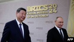 2024年10月22日，俄罗斯总统普京和中国国家主席习近平在喀山出席金砖国家领导人会晤欢迎仪式。