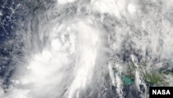 This visible image of Tropical Storm Hermine was taken by the MODIS instrument aboard NASA's Aqua satellite at 2:55 p.m. EDT (18:55 UTC, Sept. 1, 2016, as it continued to strengthen in the Gulf of Mexico. (Credits: NASA Goddard MODIS Rapid Response Team)