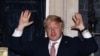 Britain's Prime Minister Boris Johnson applauds outside 10 Downing Street during the Clap For Our Carers campaign in support of the NHS, as the spread of the coronavirus disease (COVID-19) continues, London, Britain, March 26, 2020. 