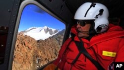 U.S. Secretary of State John Kerry flies over the Taylor Valley area near McMurdo Station, Antarctica, Nov. 11, 2016. 