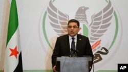 Expatriate Ghassan Hitto was chosen interim prime minister in March by Syria’s opposition organization, the National Coalition for Syrian Opposition and Revolutionary Forces. Secular and independent members objected, claiming he had no political experience.
