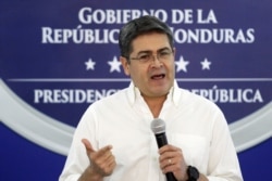 FILE - Honduran President Juan Orlando Hernandez holds a news conference at the Presidential House in Tegucigalpa, Honduras, Oct. 3, 2019.