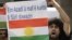 A Kurd opposed to Syrian President Bashar Assad shouts slogans during a sit-in in front of the Syrian embassy, in Beirut, Lebanon, Sunday, Oct. 23, 2011