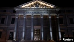 FILE - The Spanish Parliament building is seen at night in central Madrid, Spain, March 2, 2016. 
