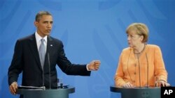 Presiden AS Barack Obama (kiri) dan Kaselir Jerman Angela Merkel dalam konferensi pers bersama di Berlin, Jerman hari Rabu (19/6). 