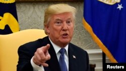 U.S. President Donald Trump speaks in the Oval Office of the White House in Washington, Oct. 10, 2017. 