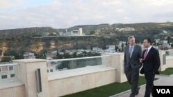 იან კელი და ირაკლი ღარიბაშვილი