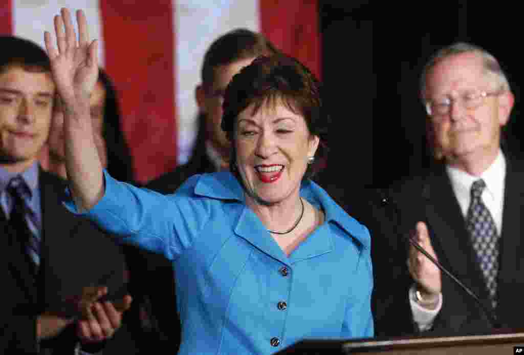 Avec son mari Thomas Daffron, à droite, la sénatrice républicaine de Maine Susan Collins célèbre sa réélection mardi 4 novembre 2014, à Portland, Maine. Elle a battu la démocrate Shenna Bellows. 
