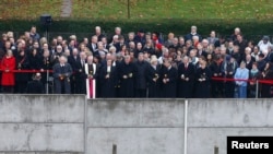 2014年11月9日，德国总理默克尔和各界要人出席纪念柏林墙倒塌25周年的活动