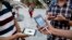 Iranians play Pokemon Go in northern Tehran's Mellat Park, Aug. 3, 2016. Iran was quick to ban the global gaming craze but as with many of the Islamic republic's internet controls, tech-savvy youngsters have carried on regardless.