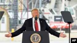 FILE - In this June 11, 2019, file photo, President Donald Trump speaks at Southwest Iowa Renewable Energy, an ethanol producer in Council Bluffs, Iowa.