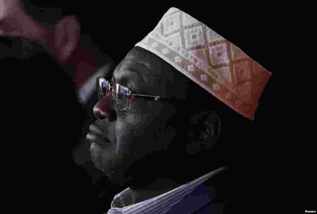 President Barack Obama's half brother Malik, a guest of Republican U.S. presidential candidate Donald Trump, sits in the crowd watching the third and final 2016 presidential campaign debate at UNLV in Las Vegas, Oct. 19, 2016. 