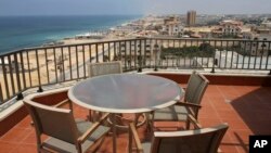 FILE - A general vista of Gaza beach and the Mediterranean Sea below the balcony of Gaza Strip's first five-star Arcmed Al Mashtal hotel in Gaza City, July 15, 2011.