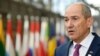 FILE - Slovenia's Prime Minister Janez Jansa arrives for an EU summit in Brussels, Belgium, Oct. 16, 2020.