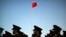FILE - Chinese paramilitary police stand in formation after a flag raising ceremony at Tiananmen Square on National Day. News of Lei Yang’s death in police custody in May sparked a national outcry, with many voicing concerns online about police brutality and abuse of power. 