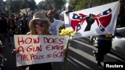 FILE - People take part in "Black Lives Matter" march around Emanuel African Methodist Episcopal Church in Charleston, June 20, 2015. 