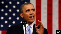 Presiden Barack Obama saat menyampaikan pidato kenegaraan di hadapan Kongres AS di Washington DC (28/1).