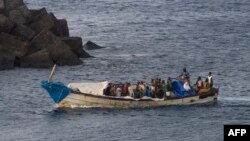 FILE - A boat with 57 migrants onboard arrives at La Restinga port on the Canary island of El Hierro on Sept. 14, 2024. At least nine migrants died and 48 went missing when the boat they were traveling in capsized near El Hierro, the Maritime Rescue Service reported on Sept. 28.