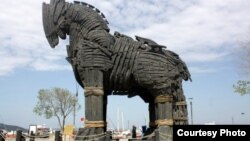 FILE - The 12-ton fiberglass Trojan Horse, used in the 2004 film Troy, dominates Canakkale's seafront, 30 meters north of the ancient city of Troy. (Photo by BusyLizzy)