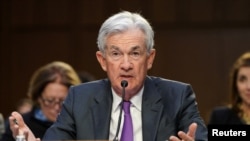 Federal Reserve Chair Jerome Powell testifies at a hearing on Capitol Hill in Washington