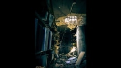 Tahany Saleh tours Mosul university’s library wrecked by IS war