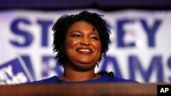 FILE - Democratic candidate for Georgia Governor Stacey Abrams speaks during an election-night watch party, May 22, 2018, in Atlanta. 