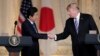 Japanese Prime Minister Shinzo Abe, left, and President Donald Trump shake hands during a news conference at Trump's private Mar-a-Lago club, April 18, 2018, in Palm Beach, Florida.