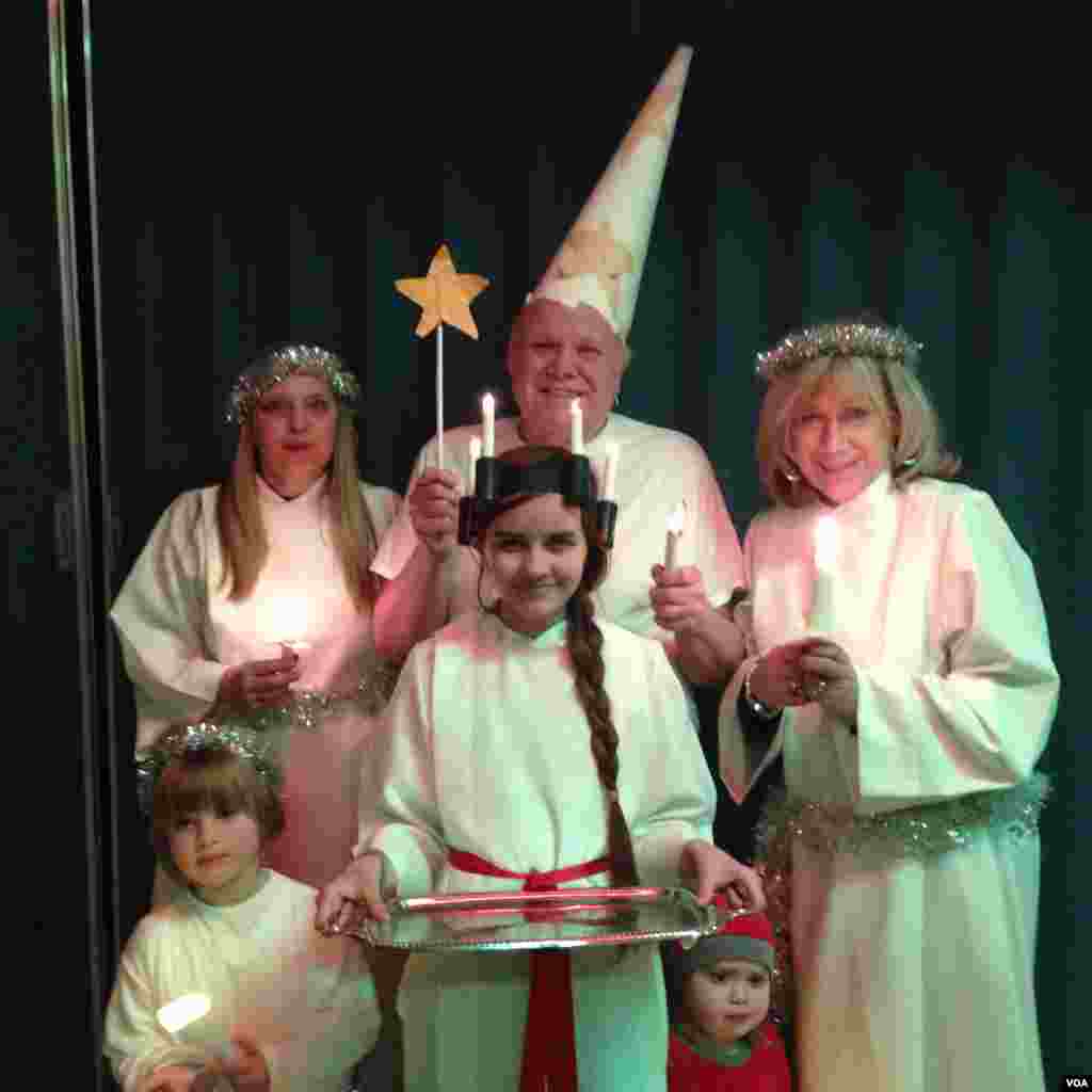 Twelve year old Rhiannon Larsen played the Saint in this year’s Sanka Lucia procession, a mainstay of Brooklyn’s Scandinavian-American community. (Adam Phillips/VOA)