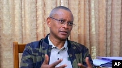 Faayilii - Dr. Debretsion Gebremichael