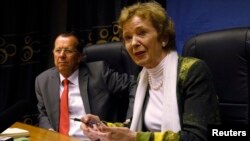 U.N. Special Envoy to the Great Lakes region Mary Robinson (R) flanked by U.N. special envoy to Congo Martin Kobler (L) address a news conference at the MONUSCO offices in Goma, eastern Democratic Republic of Congo, Sept. 2, 2013.