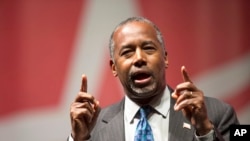 Republican presidential candidate Ben Carson speaks during the Rising Tide Summit in Cedar Rapids, Iowa, Dec. 5, 2015. Carson canceled a trip planned for later this month to Africa due to what his campaign called significant security concerns.