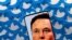 FILE PHOTO: Illustration shows Elon Musk image on smartphone and printed Twitter logos