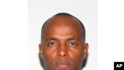 This photo provided by the city of Frederick, Md. shows Fantahun Girma Woldesenbet, a Navy medic who shot and wounded two U.S. sailors before security forces shot and killed him at a nearby Army base.