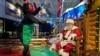 Here Comes Santa Claus — With Face Masks and Plexiglass  