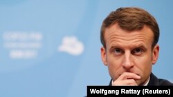 Presiden Perancis Emmanuel Macron saat mengikuti Konferensi Perubahan Iklim PBB COP23, di Bonn, Jerman, 15 November 2017. (REUTERS/Wolfgang Rattay - RC1FEB9B42E0)