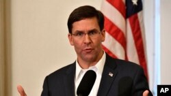FILE - US Defense Secretary Mark Esper speaks to a gathering of soldiers at the University Club at the University of Louisville in Louisville, Ky., Oct. 4, 2019. 