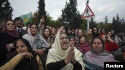 Pokistonlik ayollar norozilik namoyishida. 4-fevral 2013. 