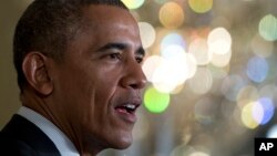 FILE - President Barack Obama speaks during a new conference in the East Room of the White House.