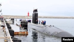 FILE - The U.S. nuclear-powered submarine USS Annapolis is anchored at a naval base on Jeju Island, South Korea, July 24, 2023. (The Defense Ministry/Handout via REUTERS)