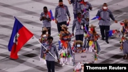 FILE -- Team Haiti participates in the athlete's parade at the Tokyo 2020 Olympics, July 23, 2021.
