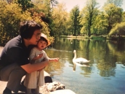 FILE - In an undated photo taken at an unknown location, Gui Minhai is seen with his daughter Angela. (Courtesy - Angela Gui via AFP)