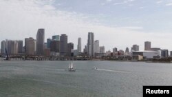 FILE - A portion of the City of Miami's skyline, is seen near the Port of Miami in Miami, Florida. Miami is among numerous cities around the world predicted to face massive flooding as a result of climate change. 