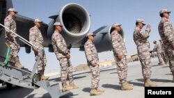 FILE - Turkish troops arrive at their military base in Doha, Qatar, June 23, 2017. 