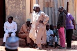 Parents gather at the Government Science School where gunmen abducted students, in Kankara, in northwestern Katsina state, Nigeria, Dec. 14, 2020.