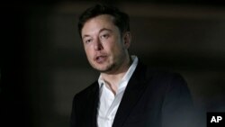 FILE - Tesla CEO and founder of the Boring Company Elon Musk speaks at a news conference in Chicago, June 14, 2018.