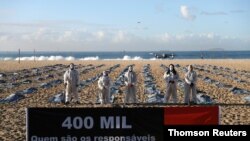 브라질의 비영리기구(NGO) 운동가들이 자이르 보우소나루 대통령의 코로나 대응에 항의해 시위를 하고 있다. 