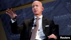 Jeff Bezos, president and CEO of Amazon and owner of The Washington Post, speaks at the Economic Club of Washington's "Milestone Celebration Dinner" in Washington, Sept. 13, 2018.