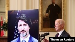 조 바이든 미국 대통령과 쥐스탱 트뤼도 캐나다 총리가 23일, 화상으로 첫 정상회담을 하고 있다. 